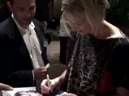 Laura Harris signs for Autograph World on 8 7 2009 at Pasadena Ritz