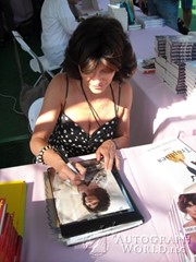 signing photo