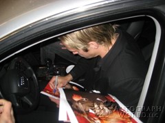 signing photo