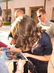 signing photo