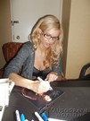 Amelia Talon signing proof