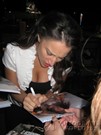 America Olivo signing proof