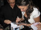 America Olivo signing proof