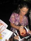 America Olivo signing proof