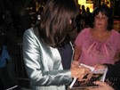 Anjelica Huston signing proof