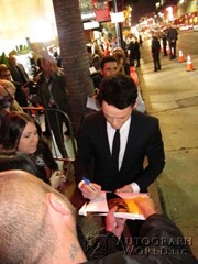 signing photo