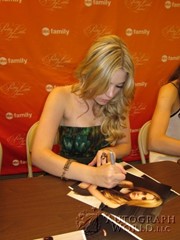 signing photo