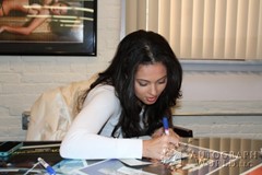 signing photo