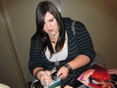 signing photo