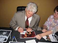 signing photo