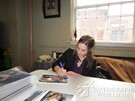 Becca Kelley signing proof
