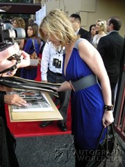 signing photo