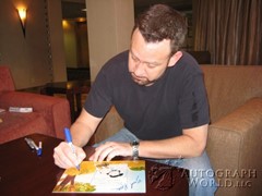 signing photo