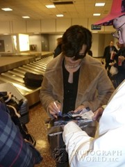 signing photo