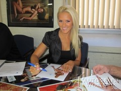 signing photo