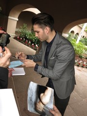 signing photo