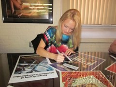 signing photo