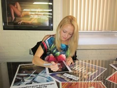 signing photo
