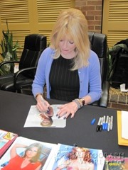 signing photo