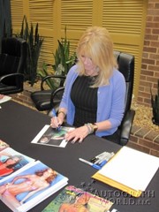 signing photo