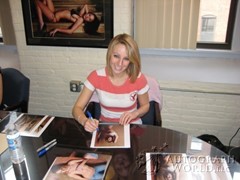 signing photo