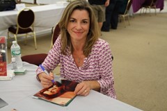 signing photo