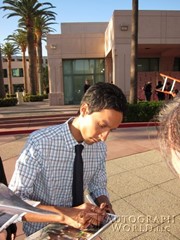 signing photo