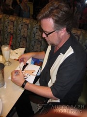signing photo