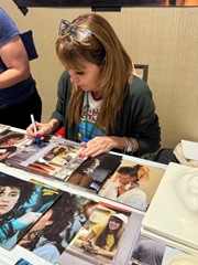 signing photo