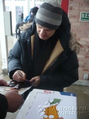 signing photo