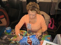 signing photo