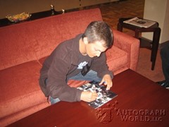 signing photo