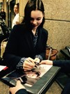 Eline Powell signing proof