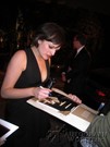Elisabeth Moss signing proof