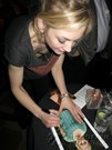 Emily Kinney signing proof