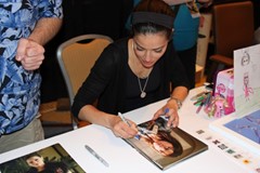 signing photo