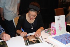 signing photo