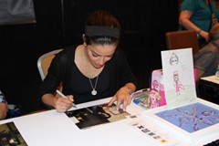 signing photo