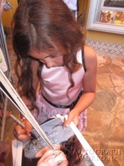 signing photo