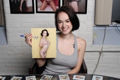 signing photo
