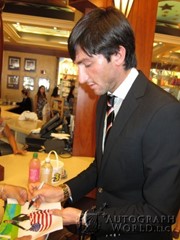 signing photo