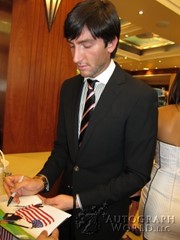 signing photo