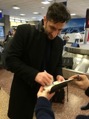 signing photo