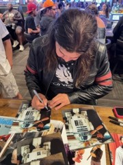 signing photo
