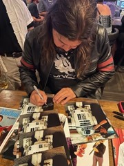 signing photo