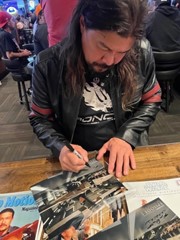 signing photo