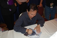 signing photo