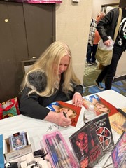 signing photo