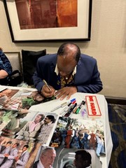 signing photo