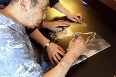 signing photo